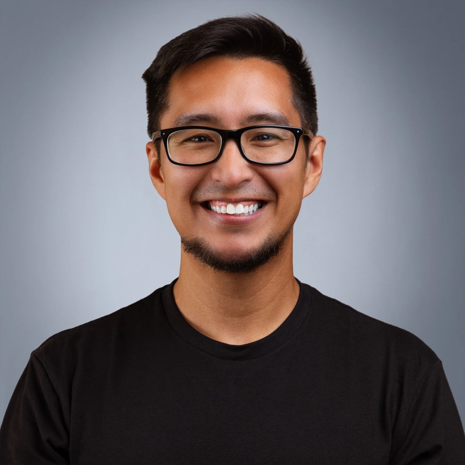 Ryan Rowan, co-founder of Marrow Systems, wearing glasses and a black T-shirt